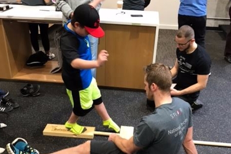 SPEAR's nationally-recognized Physical Therapists volunteer their time to help NYC's youth athletes prevent injury