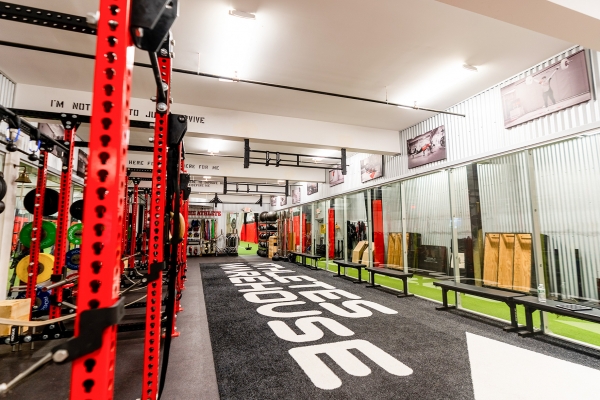 Athlete's Warehouse shared space with SPEAR including squat racks
