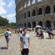 Christopher Doss in front of the Rome Colloseum