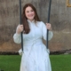 Fay Itzkowitz sitting on a swing